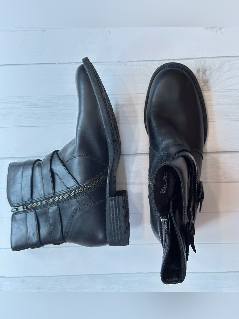 Born Black Leather Ankle Boots with Side Zip. Plaid lined.